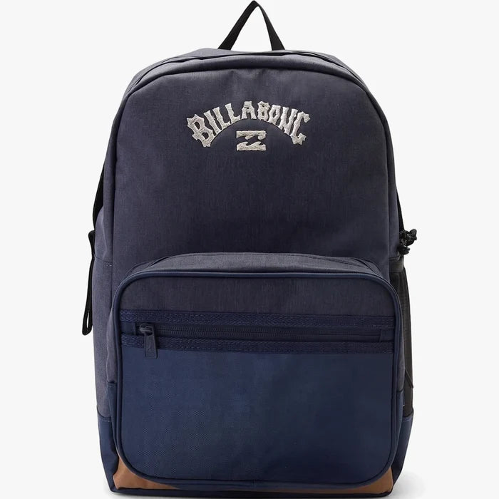 Navy heather Billabong All Day Plus Backpack with front zippered pockets and a brown base, shown standing upright.