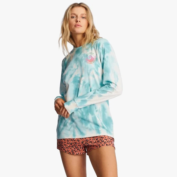 Billabong Women's A Div Long Sleeve Tee in blue tie-dye with a pink wave logo, paired with orange leopard print shorts.