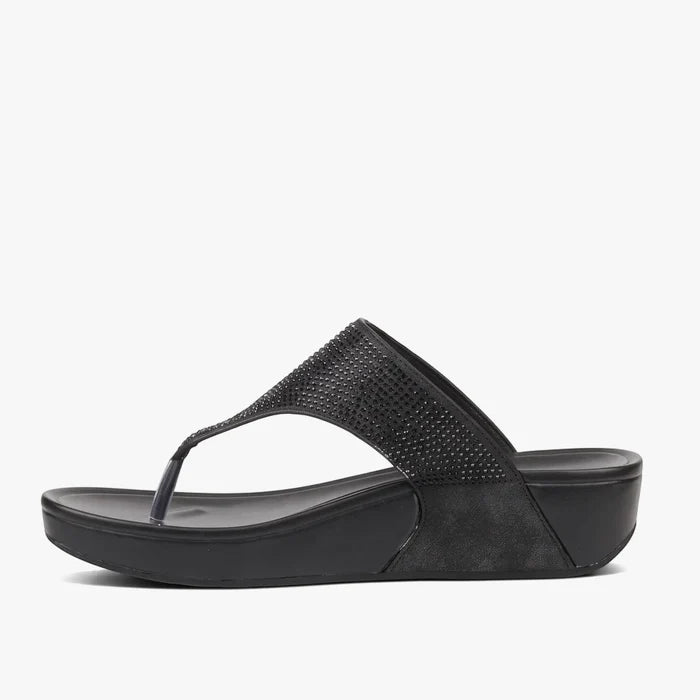Black Butterfly Feet Womens Daya wedge sandal, featuring an embellished thong strap, displayed in a side profile view.