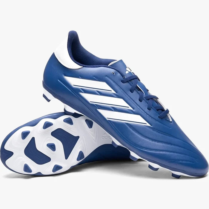 A pair of new Adidas Copa Pure 2.4 Fxg soccer cleats in blue with white stripes, shown resting on a white surface, ready for