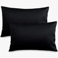 Two black Cotton Co. 400 thread count standard pillowcases, size 45x70, arranged on a surface.