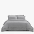 Silver Cotton Co Egyptian Cotton 400 Thread Super King 260x230 duvet cover on a neatly made bed with pillows and bedside