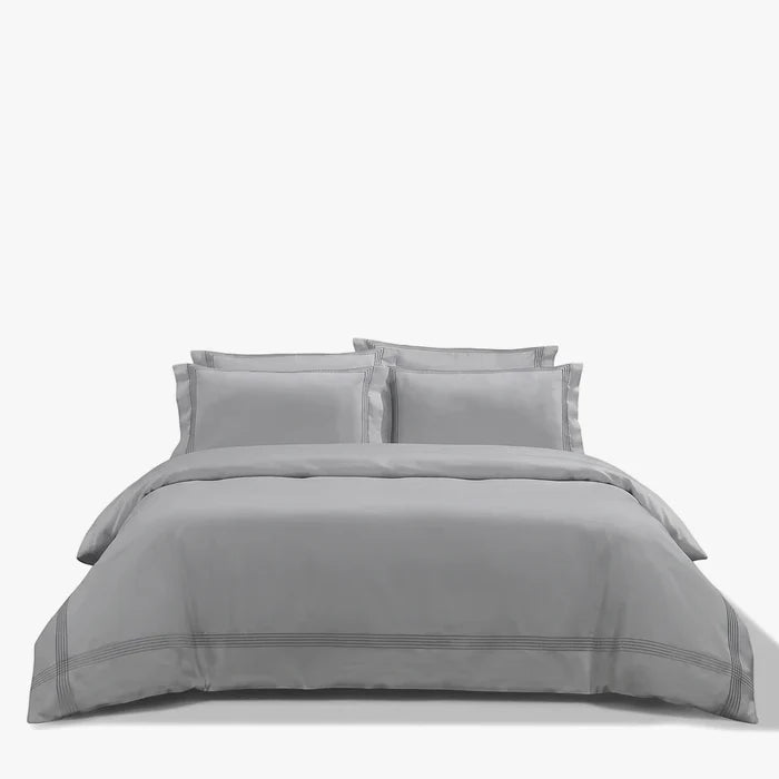 Silver Cotton Co Egyptian Cotton 400 Thread Super King 260x230 duvet cover on a neatly made bed with pillows and bedside