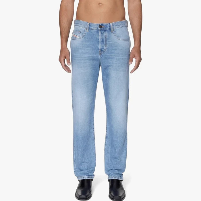 Diesel Mens 2020 D Viker regular fit mid-waist straight leg jeans in a light blue stone wash, modeled standing.