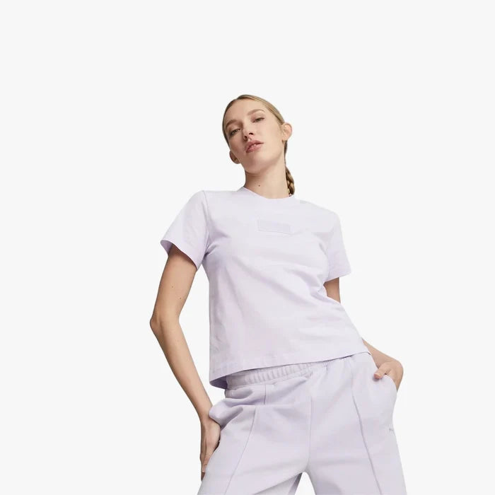 Woman modeling a Spring Lavender Puma Ferrari Style Short Sleeve Tee with a subtle chest logo. She is also wearing matching