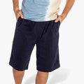 Black Lizzard Mens Strollers Walkshort worn by a model with hands in pockets, front view.