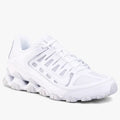 White Nike Men's Reax 8 Mesh Trainer shoe, shown angled from the side, highlighting its mesh upper and cushioned sole.