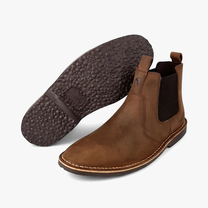 Puma Mens Terrae Chelsea boots, pecan brown leather, with elastic side panels, pull tab, and rugged textured sole, displayed