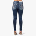Miss Me Natures Cross Mid Rise Skinny Jeans for women, dark blue wash with rhinestone cross embroidery on back pockets. Rear