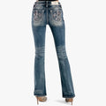 Miss Me Womens Perfect Light Bootleg Jeans in blue, back view, featuring intricate rhinestone and sequin embellished pockets