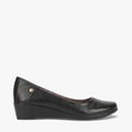 Pierre Cardin Women's Charlotte 2 black wedge heel shoe, made from a smooth leather-like material, viewed from the side.