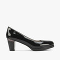 Pierre Cardin Women's Matilda 1 black patent leather pump with a block heel, shown from the side.