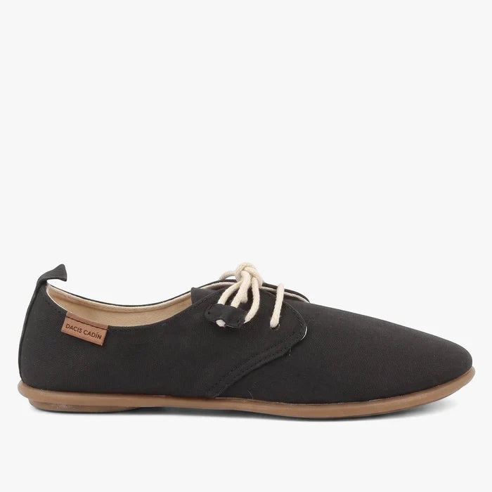 Pierre Cardin Women's Riviera lace-up shoes in black canvas with light brown soles, shown from a side view.