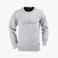 Salomon Girls Countryside Pullover in grey melange. A classic long-sleeve crewneck sweatshirt with embroidered branding on