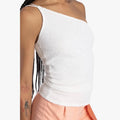 Sissy Boy Off White Asymmetric Sequin Top, featuring a one-shoulder design and full sequin embellishment, worn by a model.