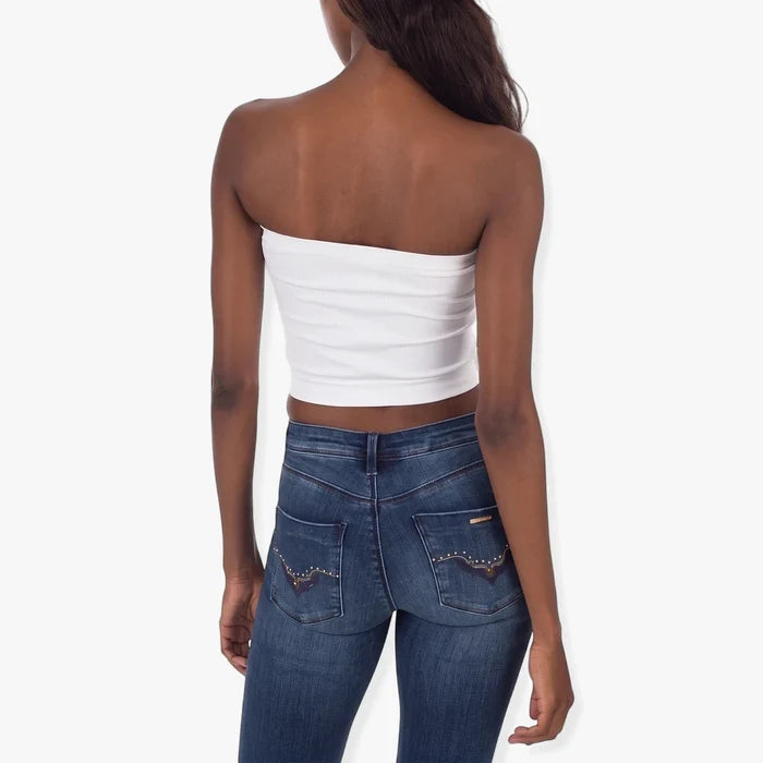 Sissy Boy Womens Mara Seamless Bandeau Top in white, worn by a model from the back, paired with blue denim jeans.