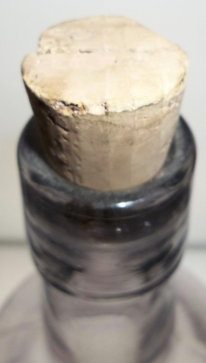 W.H. Jones & Co. Liquor Bottle