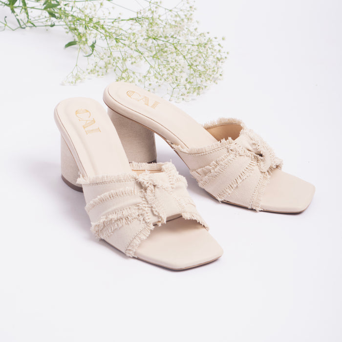 White Ruffled Heels